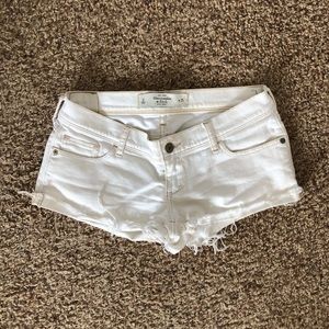 White denim cutoff shorts